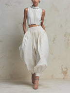 Elegant White Two Piece Set For Women – Sleeveless Pleated Crop Top & High Waist Balloon Pants Co-Ord Set