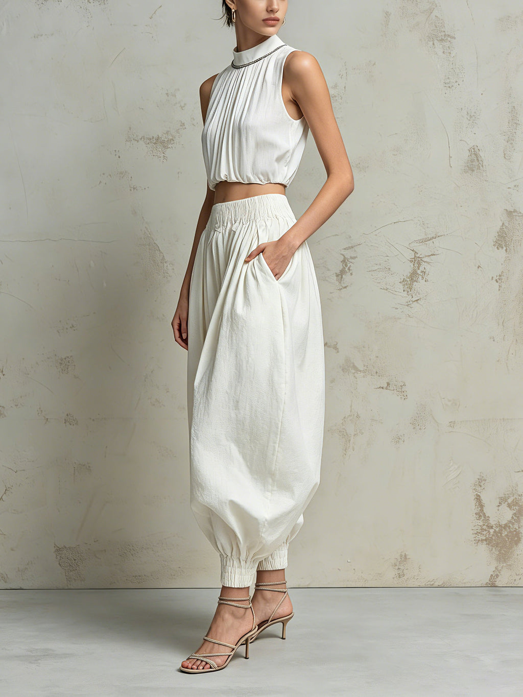 Elegant White Two Piece Set For Women – Sleeveless Pleated Crop Top & High Waist Balloon Pants Co-Ord Set