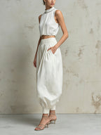Elegant White Two Piece Set For Women – Sleeveless Pleated Crop Top & High Waist Balloon Pants Co-Ord Set