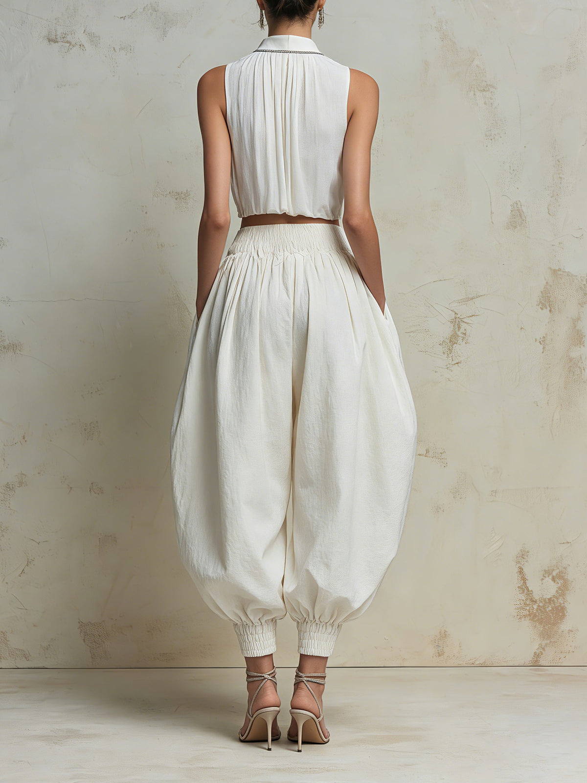 Elegant White Two Piece Set For Women – Sleeveless Pleated Crop Top & High Waist Balloon Pants Co-Ord Set