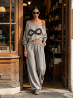 Infinity Patch Off‑Shoulder Cropped Sweatshirt & Baggy Sweatpants 2‑Piece Set